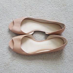 Nude peep toe flats